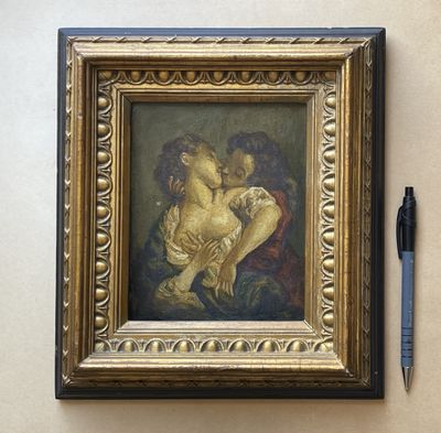 une photo d'un tableau accroché au mur, avec un stylo