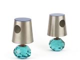 pair of silver and blue glass table lamps on a white background