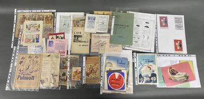many different types of postcards on display on a table