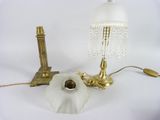a lamp that is sitting on a table next to a lamp
