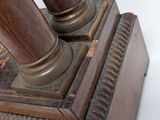 an image of a close up of a wooden pole with a clock on it