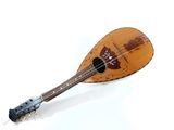 a mandolin that is sitting on a white surface