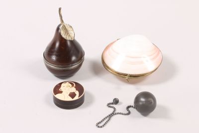 a picture of a pear and other items on a white surface