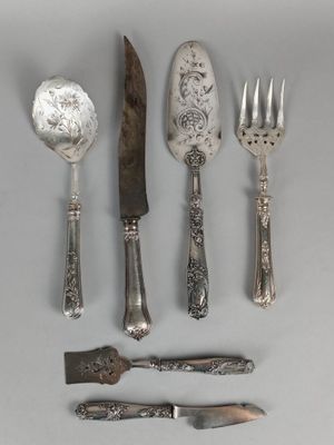 five different types of silverware on the table