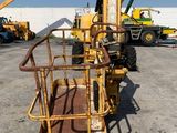 a picture of a crane that is parked in a parking lot