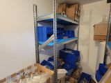 a room with a lot of boxes and boxes on the shelves