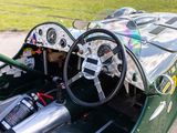 a close up of a car ' s dashboard and steering wheel
