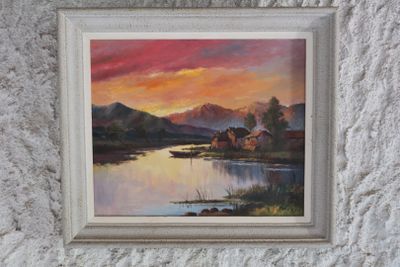 a painting on the wall of a house by the water