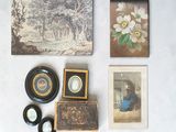 a picture of a collection of antique items on a table