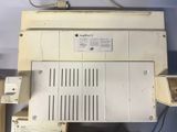 a white machine that is sitting on top of a table