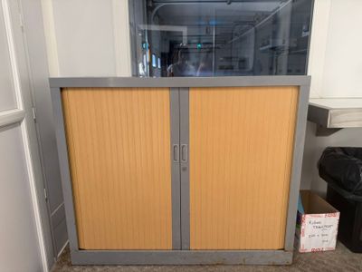 two doors that are open in a room