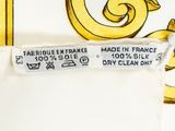 an image of a label on the back of a white dress