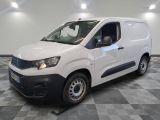 a picture of a white van parked on a checkered floor