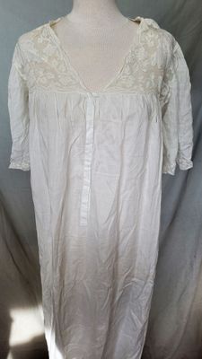 an image of a white dress on a mannequin mannequin mannequin mannequin mannequin mannequin mannequin mannequin