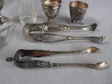 silver spoons and silverware on a table