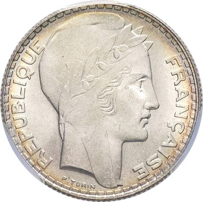 l'image d'une pièce de monnaie sur laquelle figure une tête de femme