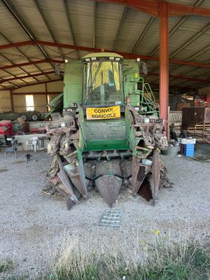 a tractor that is parked inside of a building
