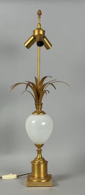 a lamp that is sitting on a table with a light on it