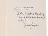 an open book with a handwritten poem on the cover