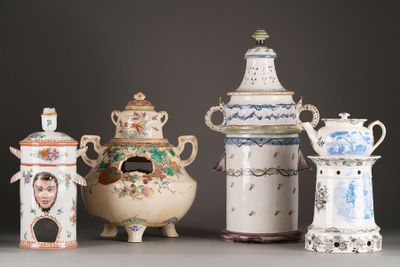 five different types of vases sitting on a table