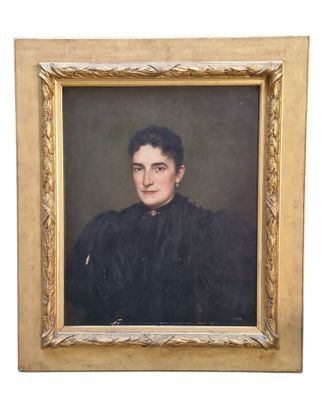 a painting of a man in a black coat is shown in a gold frame