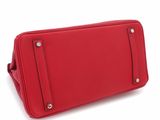 a red toilet bag on a white background