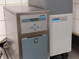 a machine that is sitting on a counter in a kitchen