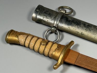 JAPON - XXe siècle. DAGUE d'officier de marine La fusée gain…