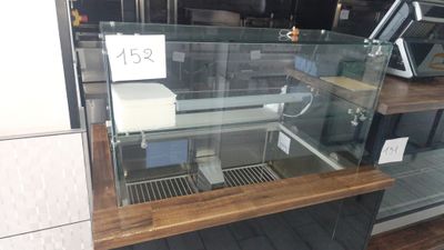 a glass case with a number on it in a store