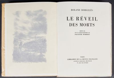 un livre ouvert sur lequel figure l'image d'un paysage