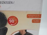 boxed picture of the back of a woman ' s head with a knitted hat on