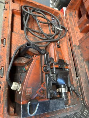 a small machine that is sitting inside of a case