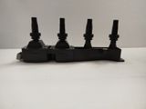 a close up of three black valves on a white surface