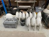 a lot of white bowls and other items on the floor