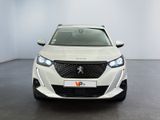 the front view of a white car in a white room