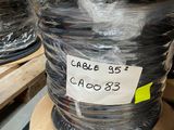 a roll of plastic wrapped up on a pallet in a warehouse