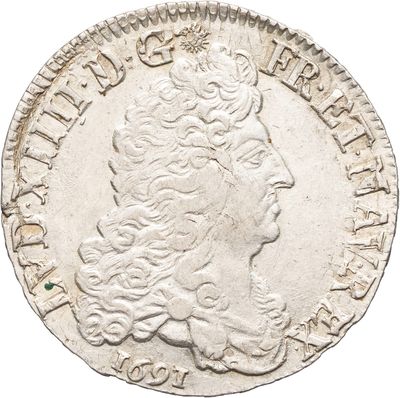 une pièce d'argent portant une tête de femme et une couronne