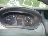 a close up of a car dashboard with a speedometer and gauges