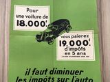 french poster of a green car and a black car on a wooden wall