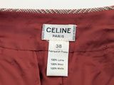 a close up of a label on a red jacket
