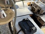 a sewing machine that is sitting on a table