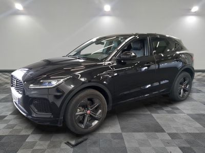 a picture of a black suv parked in a garage