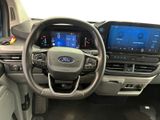 the interior of a car with a steering wheel, dashboard, and display screen
