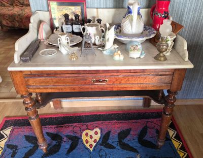 a small table with a lot of items on it