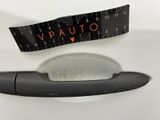 a close up of a car door handle with a measuring tape on it