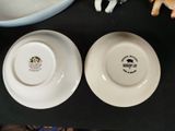 two plates that are sitting on a table