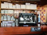 a coffee machine sitting on a counter in a kitchen