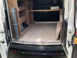 a white van that is parked in a lot