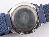 a close up of a wrist watch with a blue band