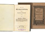 un vieux livre ouvert sur une page où figurait un titre